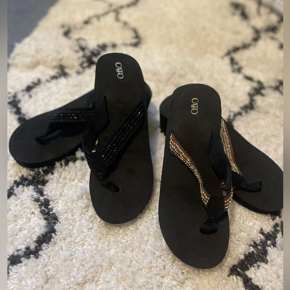 2 pair of wedge flip flops!